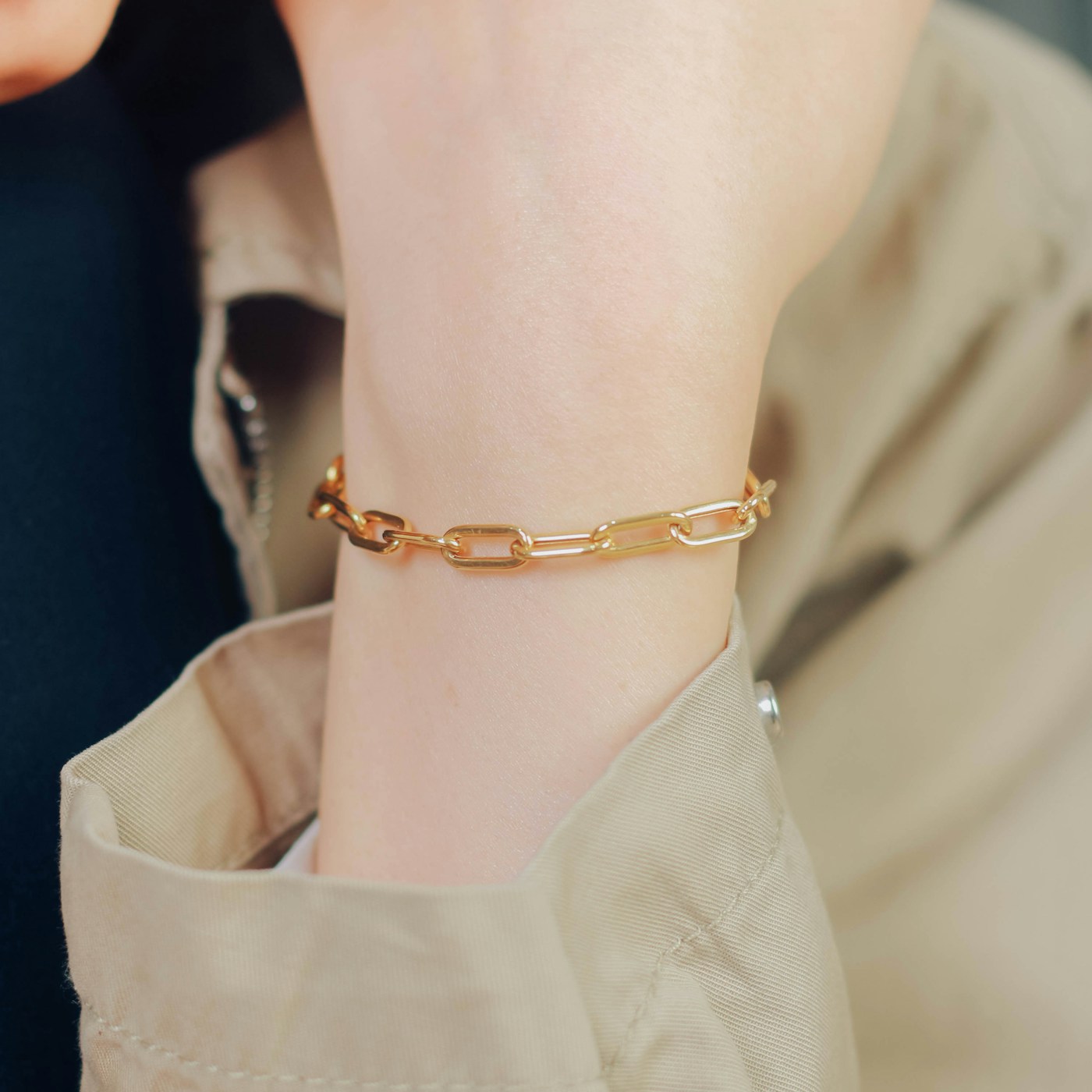 Gold bracelet worn on the wrist